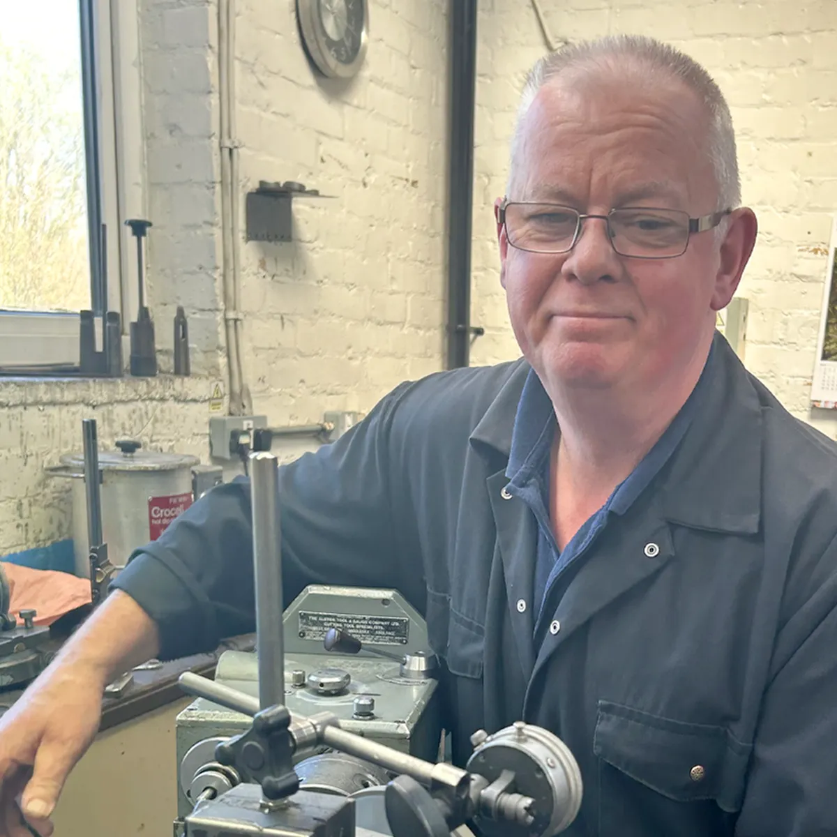Chris Heyworth at his grinding machine