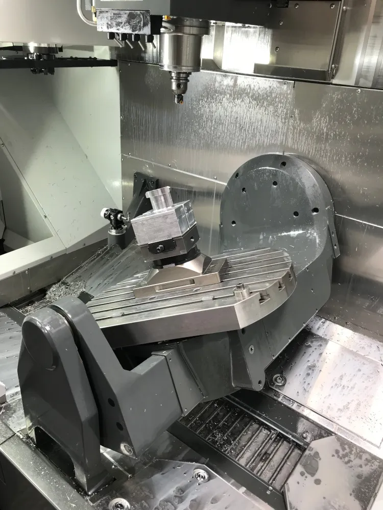 The trunnion table inside a 5-axis machining centre